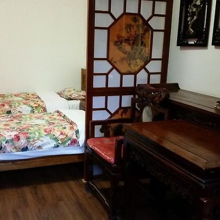 Tiananmen Best Year Courtyard Hotel Pekín Habitación foto
